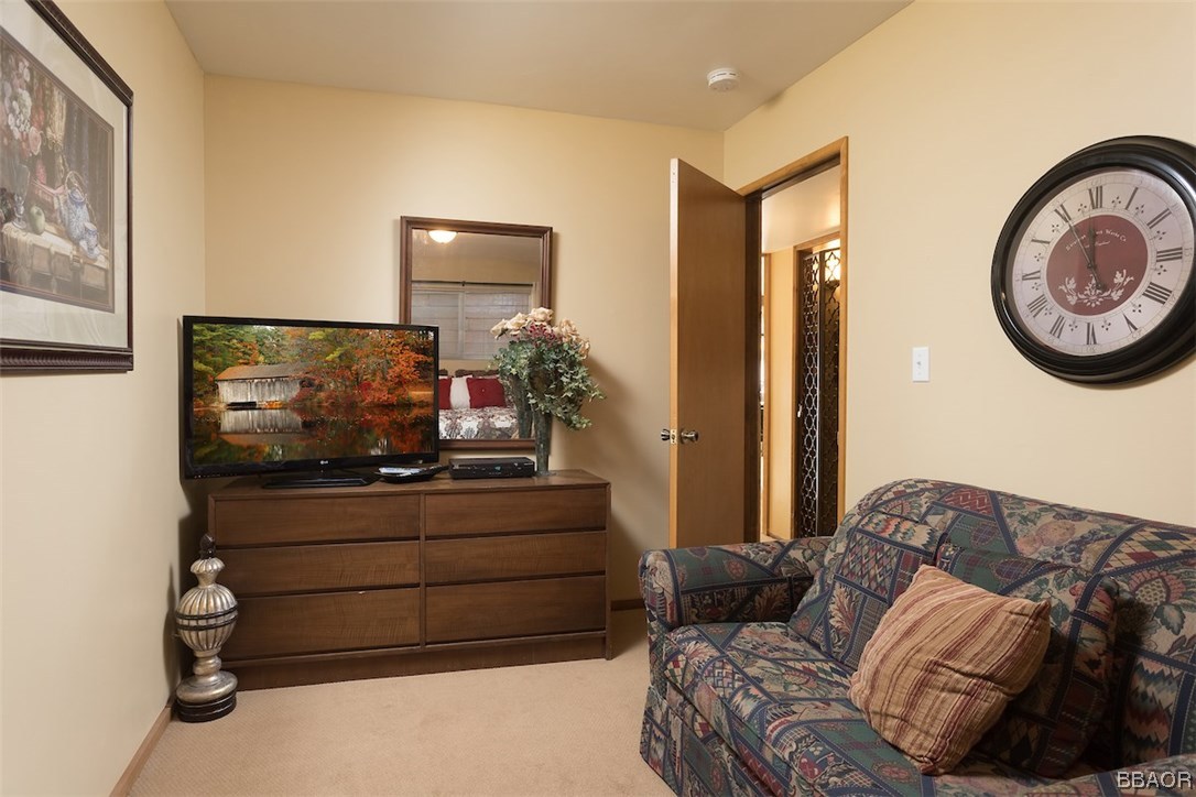738 Silver Tip Drive Big Bear Lake, CA 92315 - Photo 21 of 30 a living room with furniture and a flat screen tv