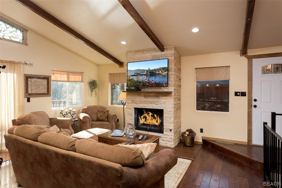 738 Silver Tip Drive Big Bear Lake, CA 92315 - Photo 7 of 30 a living room with furniture and a fireplace