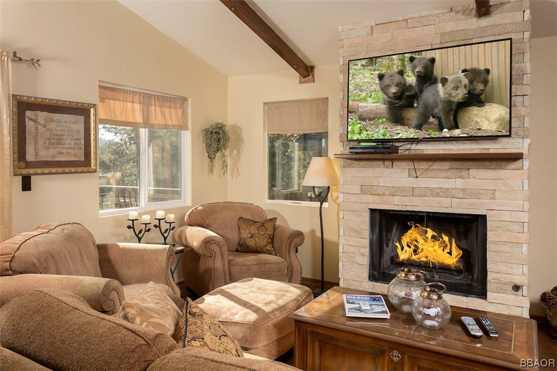 738 Silver Tip Drive Big Bear Lake, CA 92315 - Photo 9 of 30 a living room with furniture and a fireplace