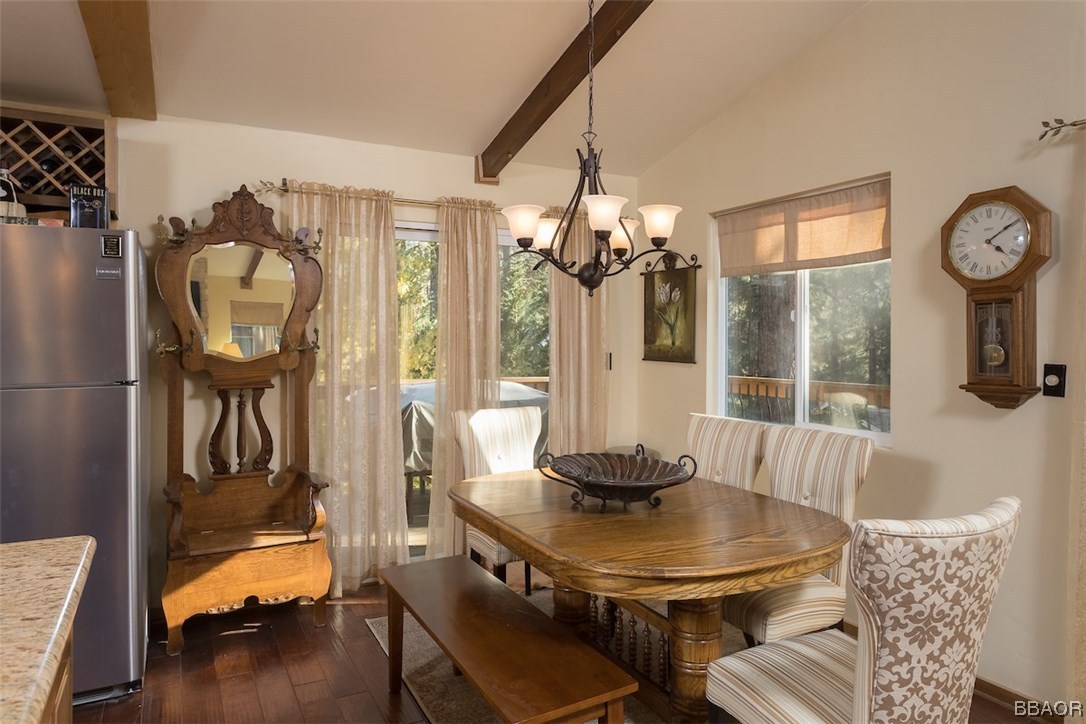 738 Silver Tip Drive Big Bear Lake, CA 92315 - Photo 10 of 30 a dining room with furniture and wooden floor