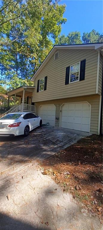 555 Browning Circle Acworth, GA 30101 - Photo 1 of 1 a front view of a house with a yard