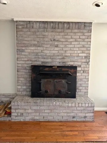 a living room with a fireplace