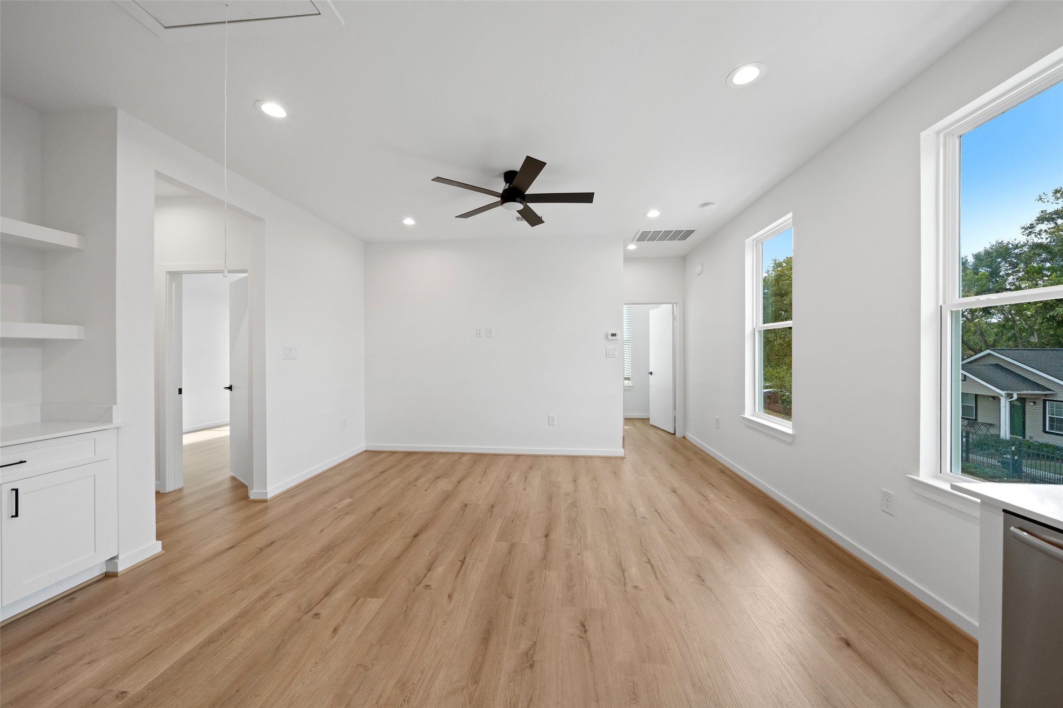1408 Enid Street Houston, TX 77009 - Photo 18 of 50 wooden floor in an empty room with a window