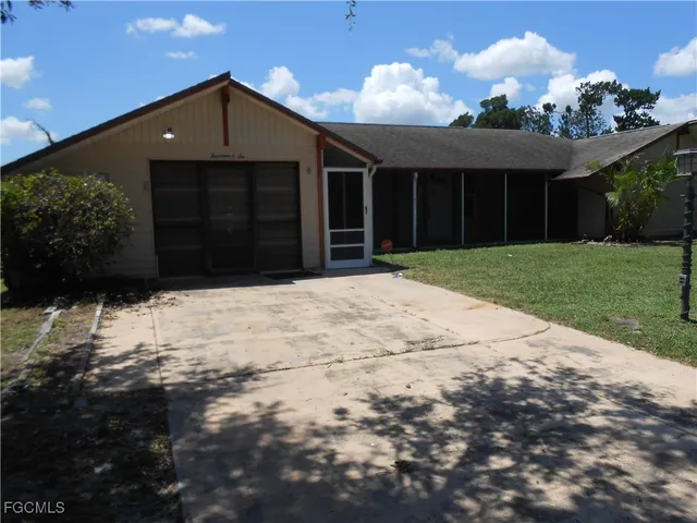 a front view of a house with a large space