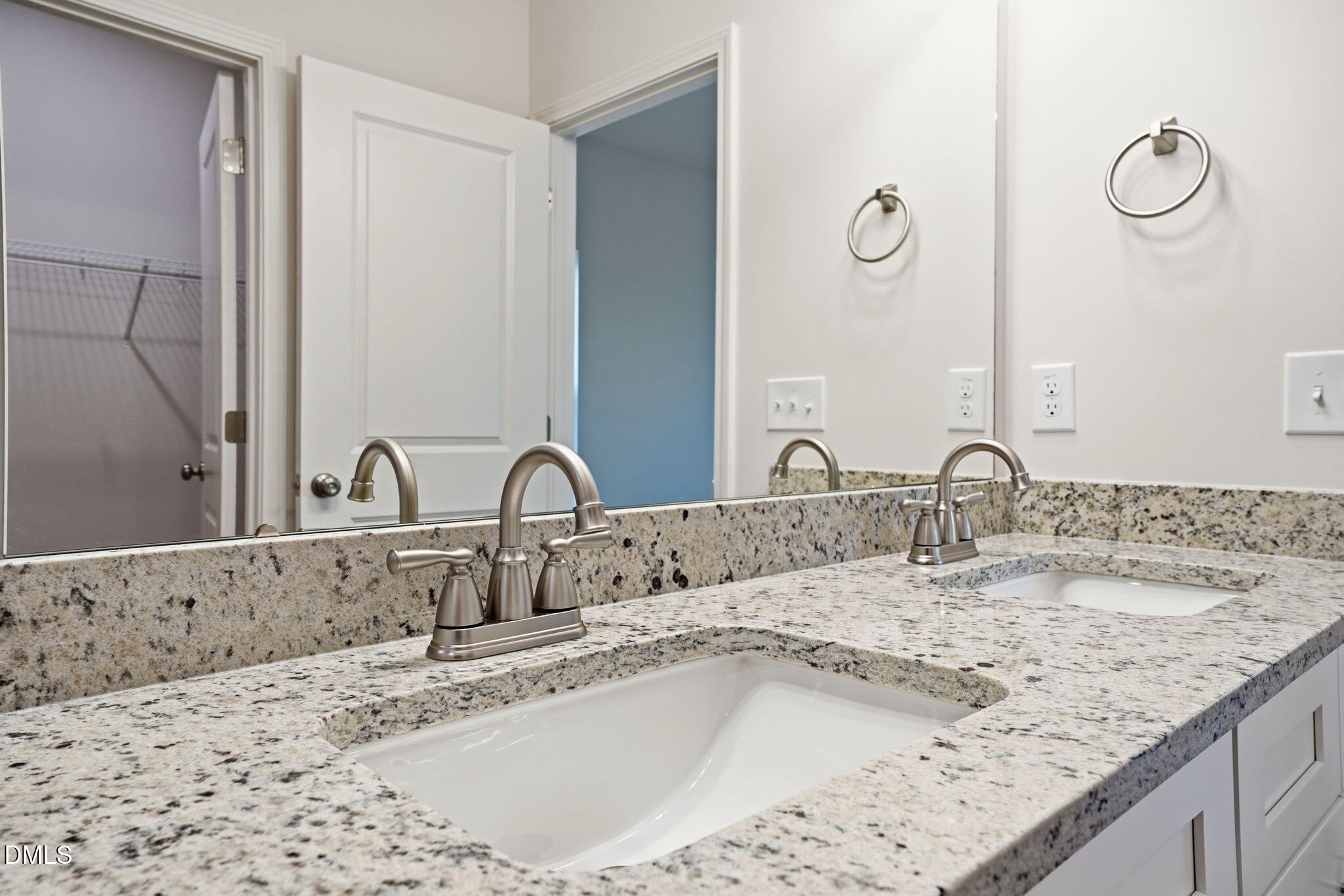 9019 Phoenix Court Spring Hope, NC 27882 - Photo 27 of 34 a bathroom with a granite countertop sink and a mirror