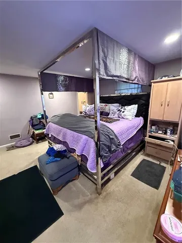 a bed room with furniture