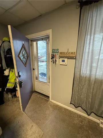 a view of a room with washer and dryer