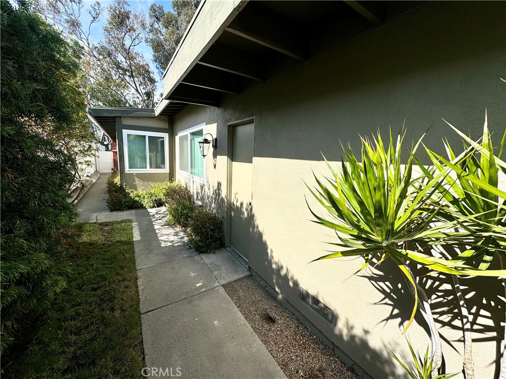 33401 Nottingham Way, Unit B Dana Point, CA 92629 - Photo 3 of 14 a view of a house with a yard
