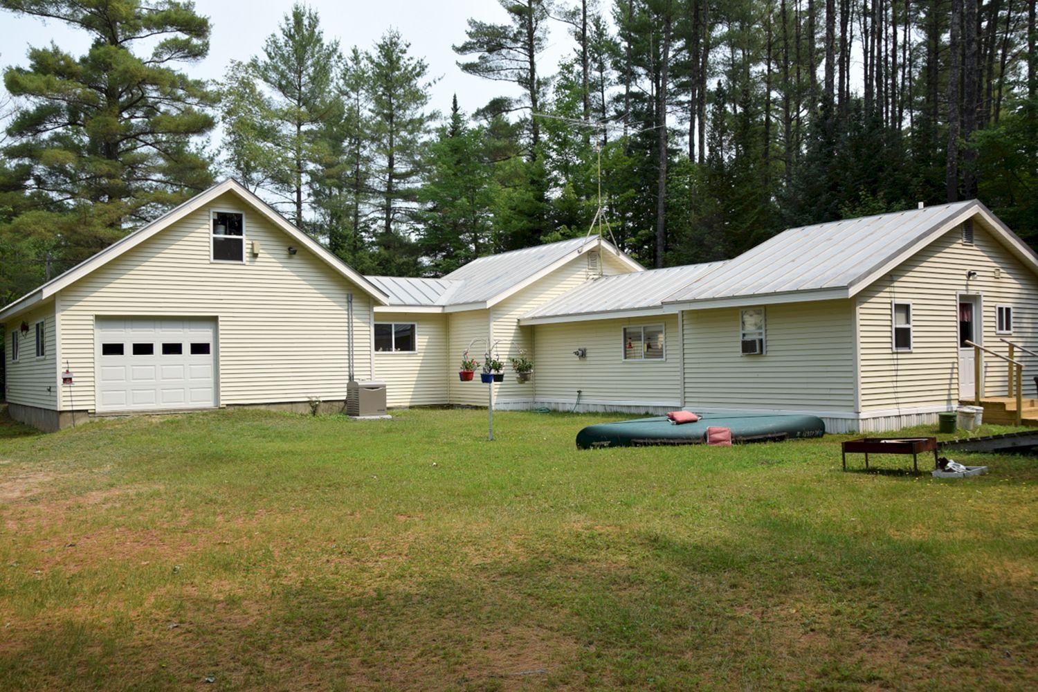 1004 Back Road New Portland, ME 04961 - Photo 3 of 21 3. side of home