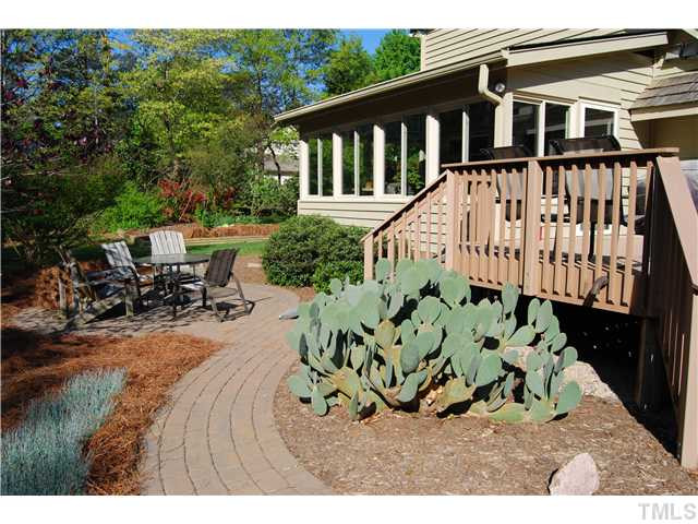 308 Baytree Lane Raleigh, NC 27615 - Photo 11 of 17 Stone patio & TREX deck are ideal outdoor living spaces!!!