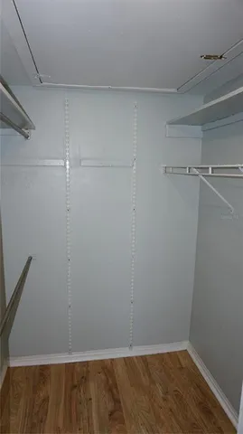 a large kitchen with granite countertop a large stove a sink dishwasher and a refrigerator