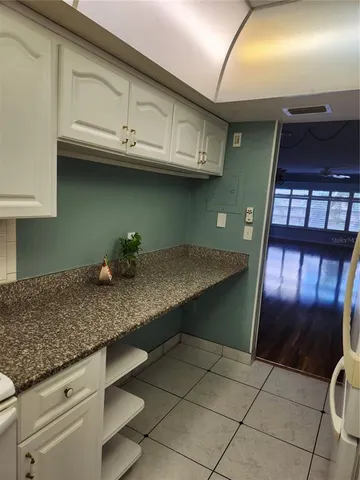 a room with a mirror and a table