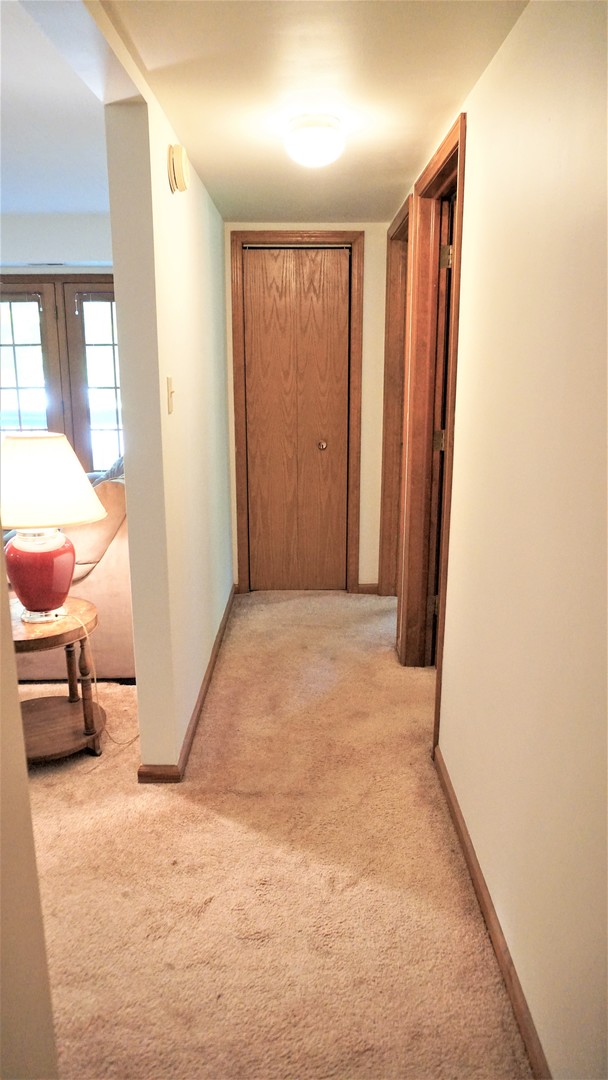 2161 Oak Road, Unit 1C Homewood, IL 60430 - Photo 10 of 17 a view of a room with gym equipment and a window