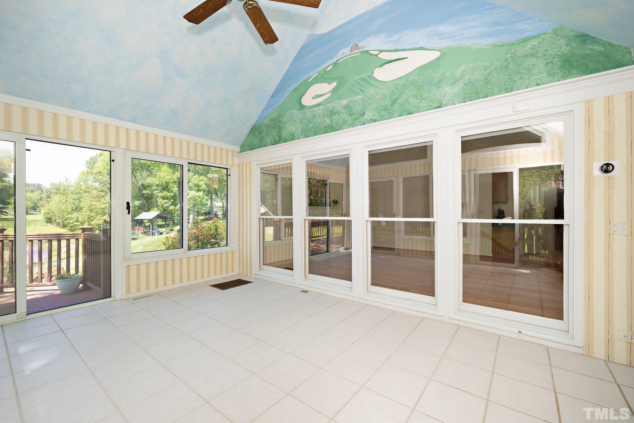 7801 Hogan Drive Wake Forest, NC 27587 - Photo 19 of 51 a view of an empty room with a window
