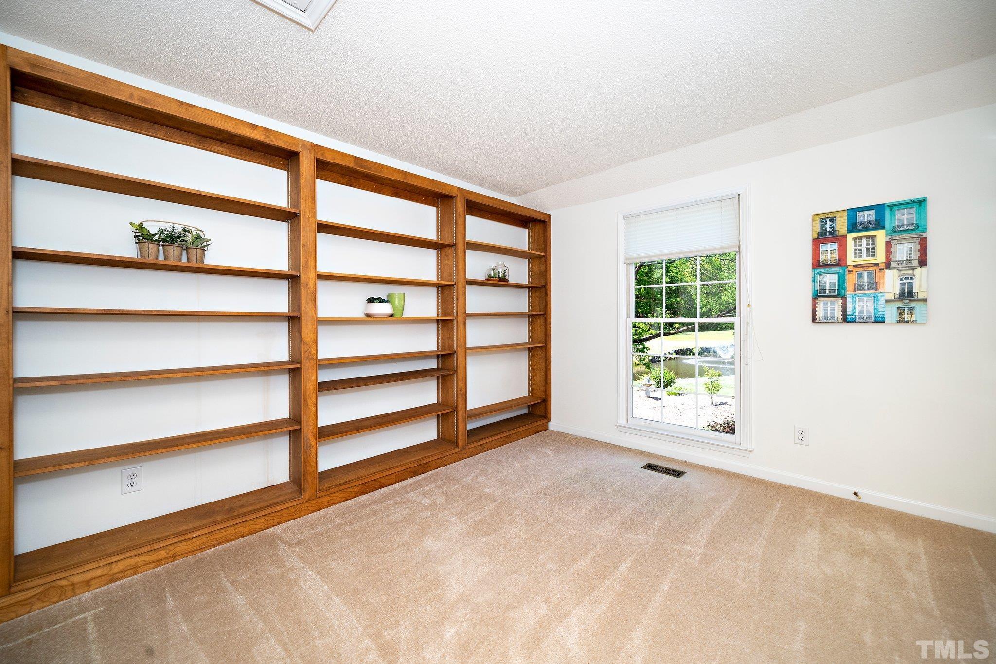 7801 Hogan Drive Wake Forest, NC 27587 - Photo 26 of 51 a view of an empty room with a window