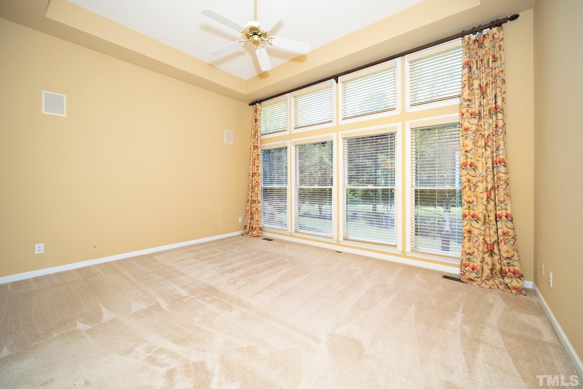 7801 Hogan Drive Wake Forest, NC 27587 - Photo 31 of 51 a view of an empty room with a window