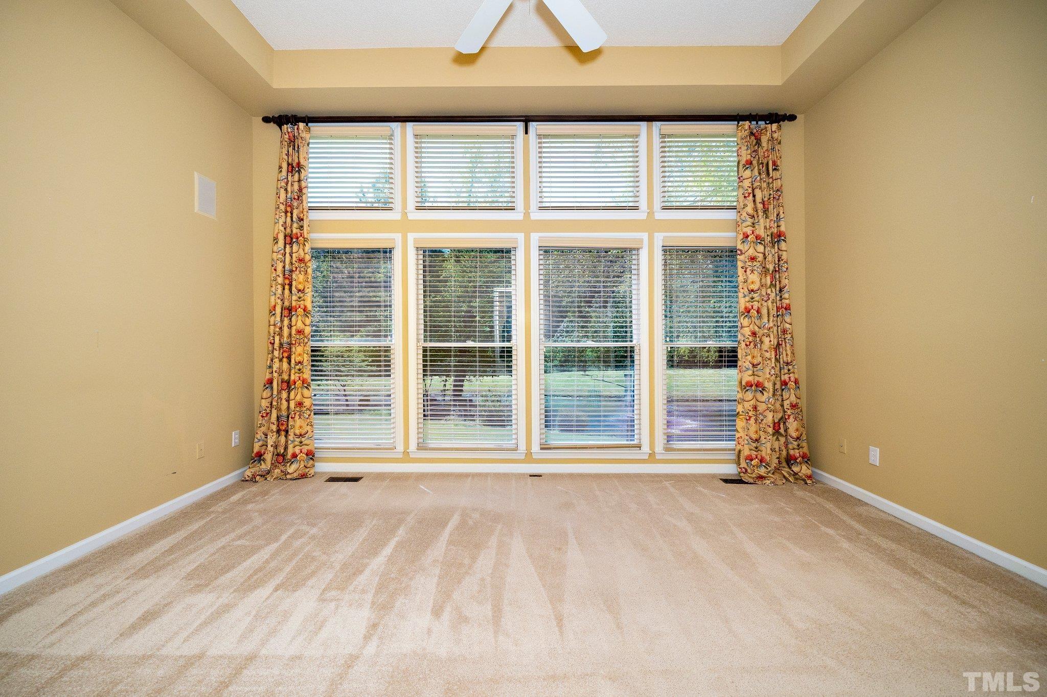 7801 Hogan Drive Wake Forest, NC 27587 - Photo 32 of 51 a view of an empty room with a window