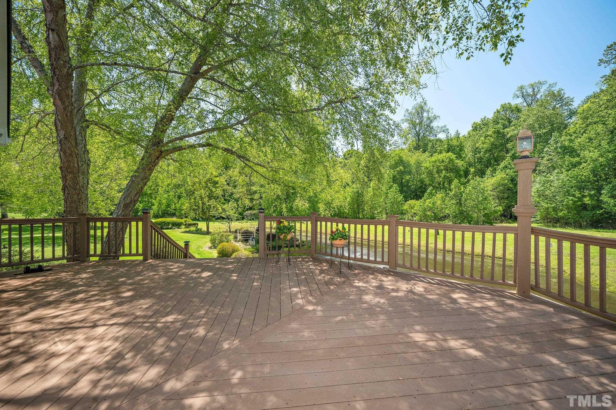 7801 Hogan Drive Wake Forest, NC 27587 - Photo 38 of 51 a view of a park with a large trees