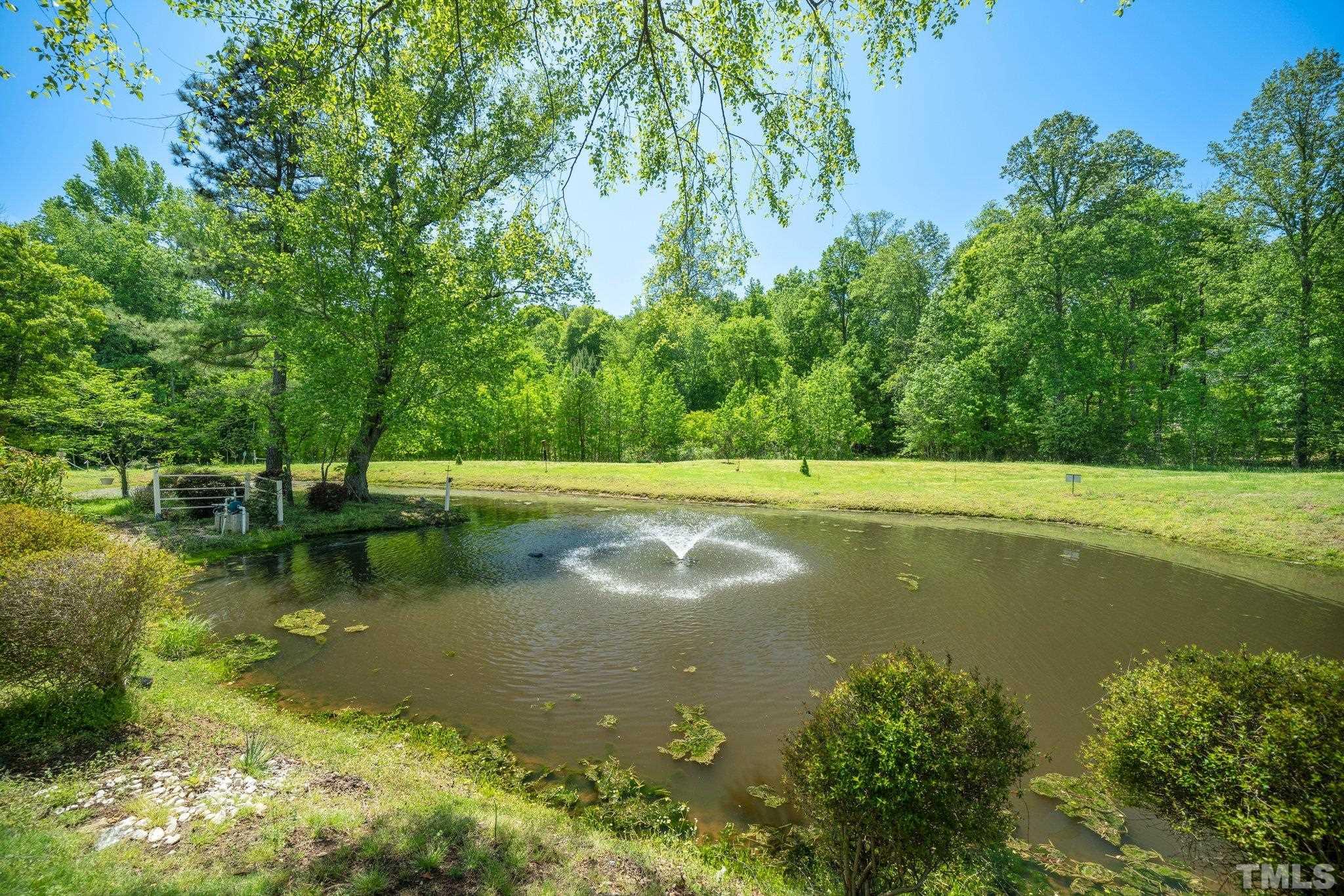 7801 Hogan Drive Wake Forest, NC 27587 - Photo 43 of 51 a view of pool with outdoor space and trees