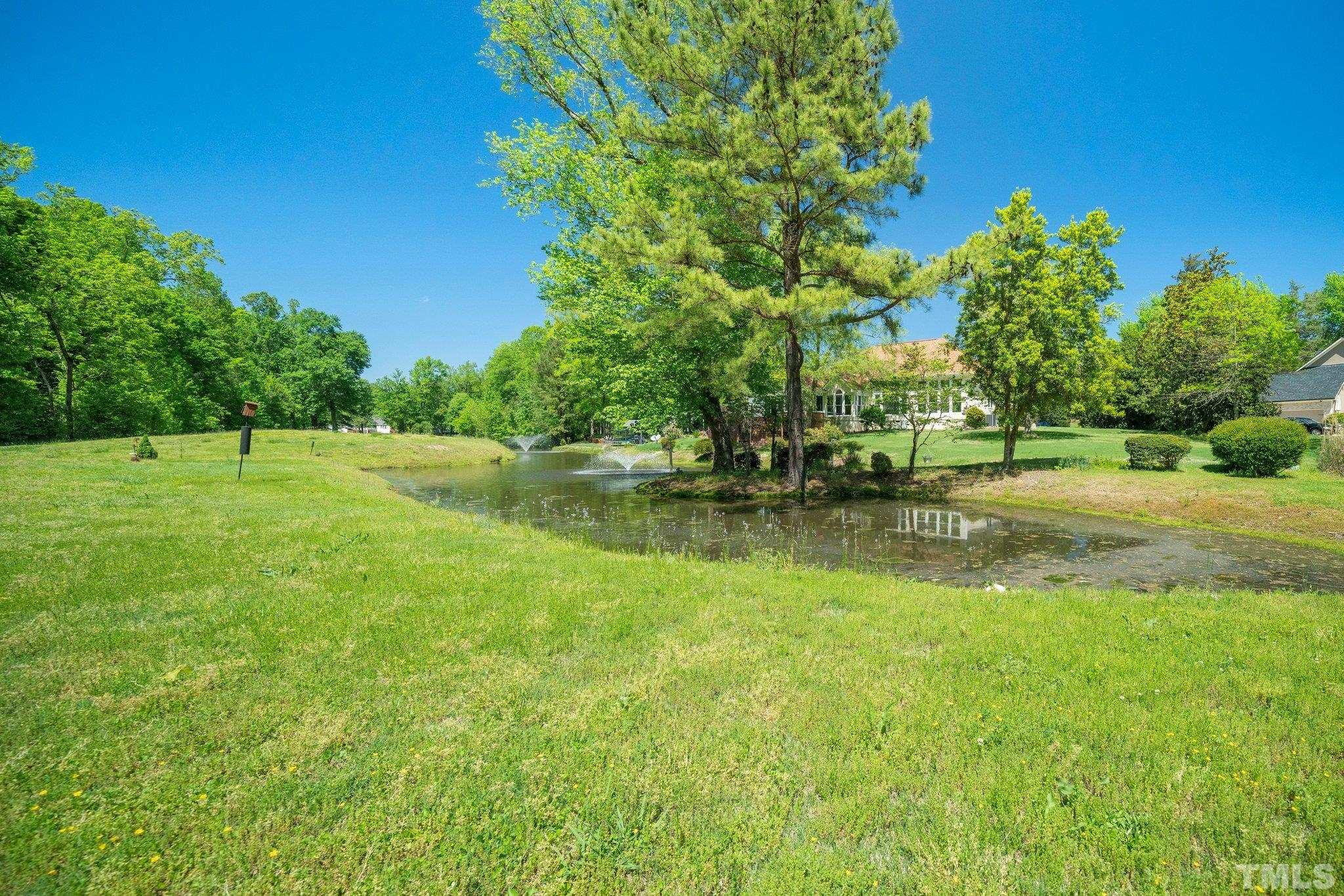 7801 Hogan Drive Wake Forest, NC 27587 - Photo 45 of 51 a view of a park with large trees