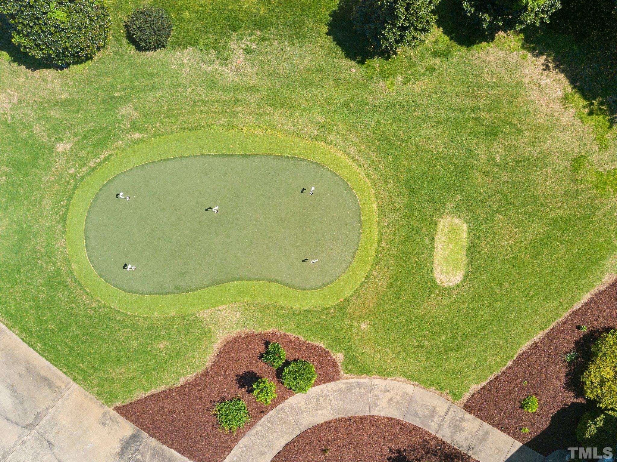 7801 Hogan Drive Wake Forest, NC 27587 - Photo 49 of 51 a bathroom with a sink mirror and toilet