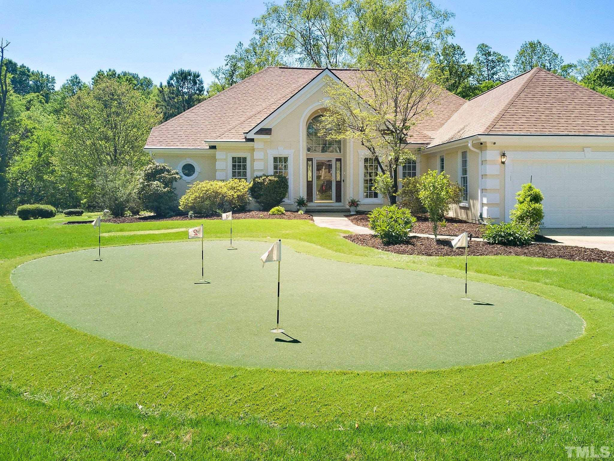 7801 Hogan Drive Wake Forest, NC 27587 - Photo 50 of 51 a view of a house with swimming pool