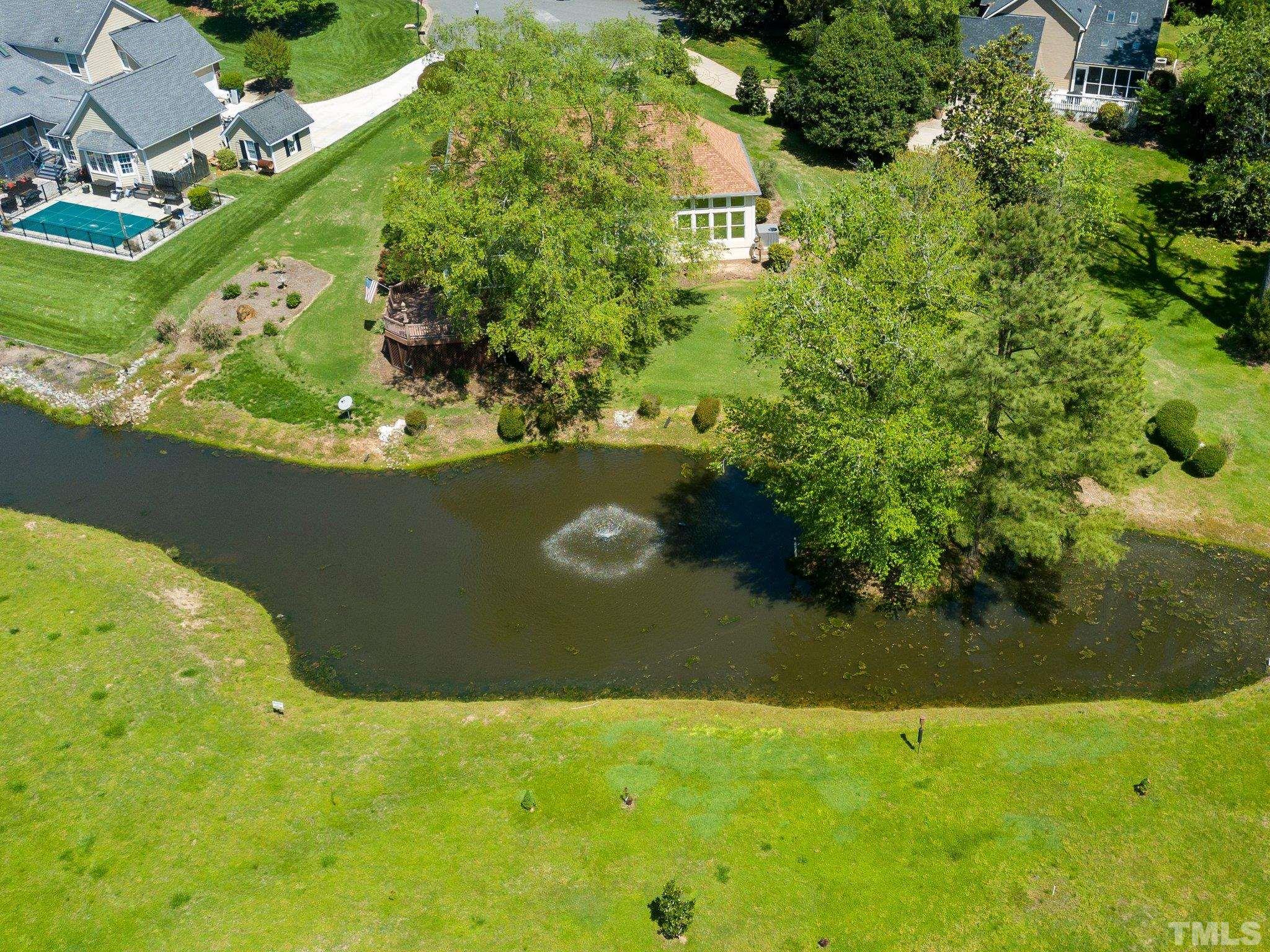 7801 Hogan Drive Wake Forest, NC 27587 - Photo 8 of 51 an aerial view of a residential houses with yard