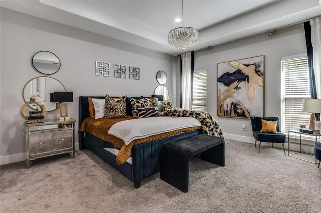 a bedroom with bed and window