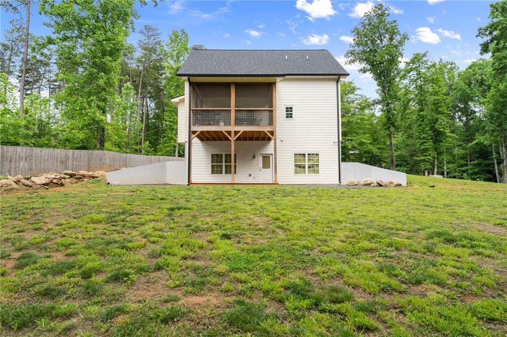 1300 Preacher Campbell Road Clarkesville, GA 30523 - Photo 30 of 34 a view of a house with a yard