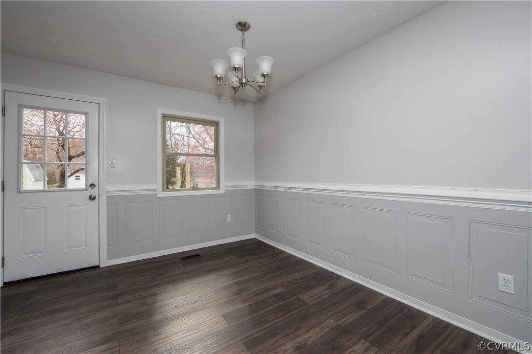4525 Twelveoaks Road Midlothian, VA 23112 - Photo 4 of 24 Dining area with wainscoting, chair rail and new l