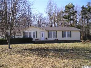 3718 Richardson Road Monroe, NC 28112 - Photo 1 of 5 a front view of a house with garden