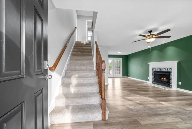 a view of an entryway with a fireplace