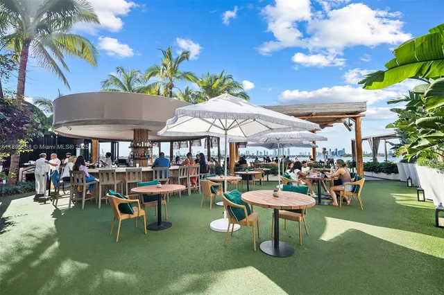 a area with lots of table and chairs