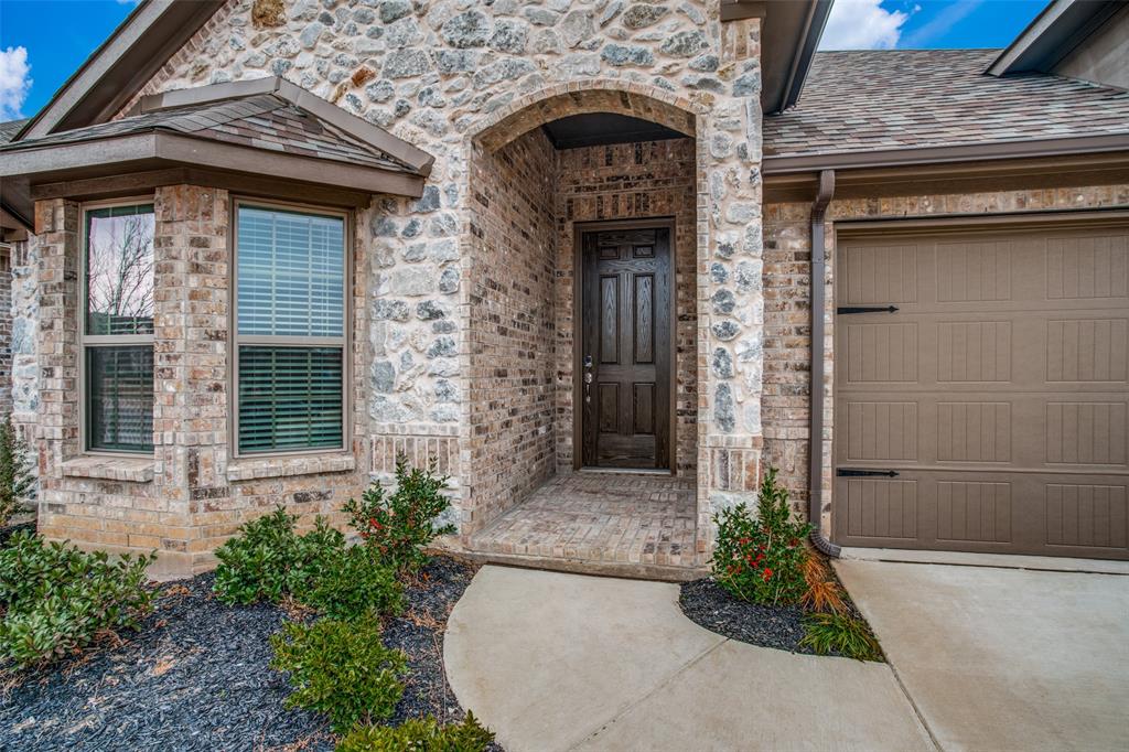 2708 Country Church Road McKinney, TX 75071 - Photo 2 of 12 a front view of a house with plants
