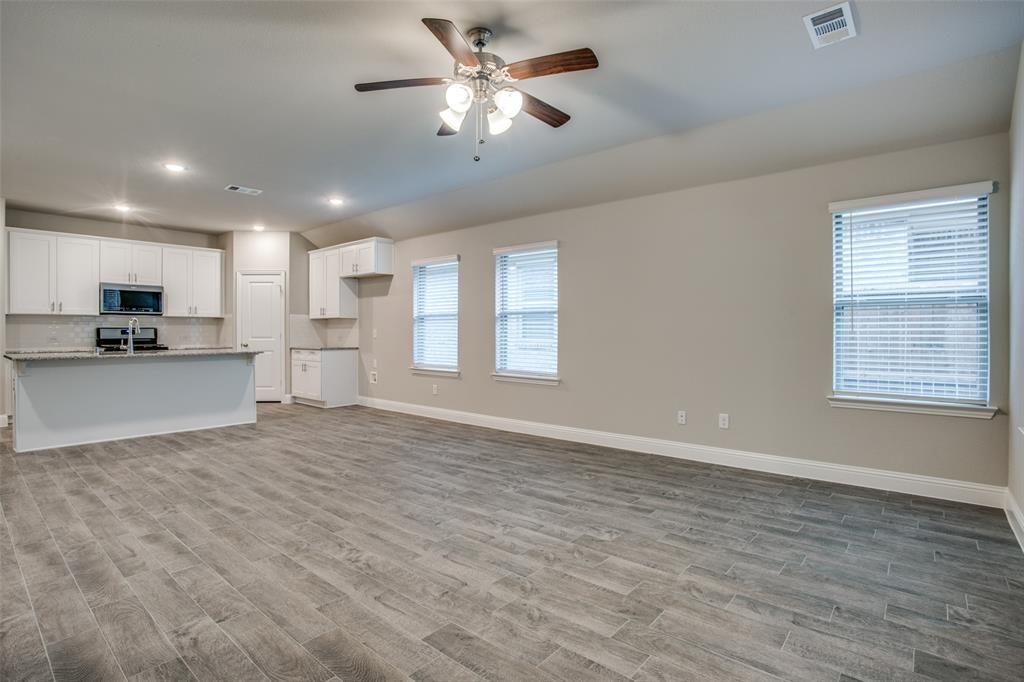 2708 Country Church Road McKinney, TX 75071 - Photo 7 of 12 a view of a kitchen with a sink and a window