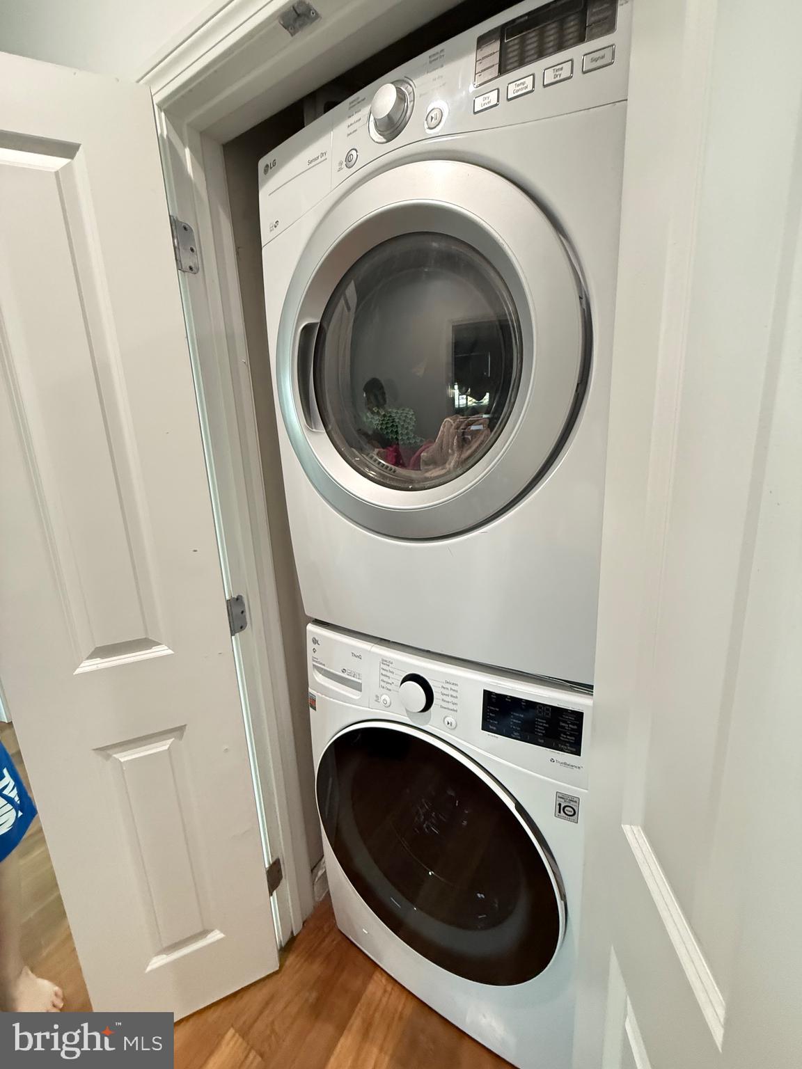 901 North Penn Street, Unit R2101 Philadelphia, PA 19123 - Photo 26 of 33 a utility room with dryer and washer