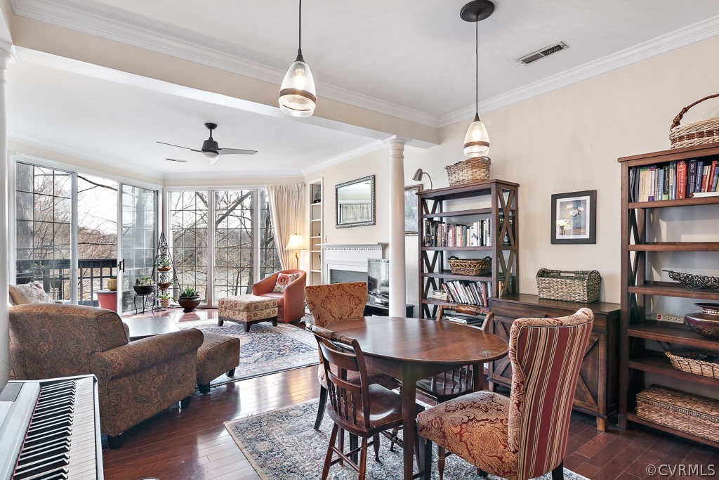 1767 Raintree Commons Drive Henrico, VA 23238 - Photo 12 of 27 a dining room with furniture a flat screen tv and a large window
