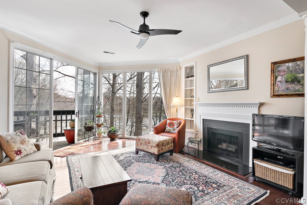 1767 Raintree Commons Drive Henrico, VA 23238 - Photo 13 of 27 a living room with furniture and a fireplace