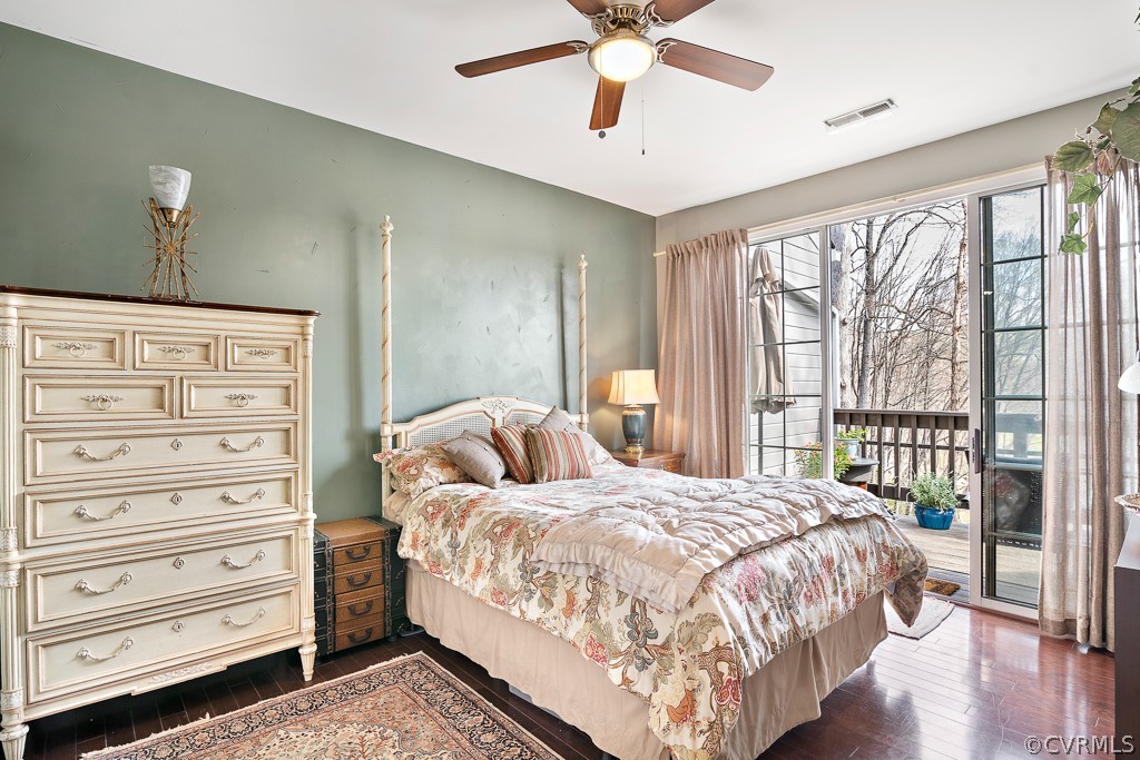 1767 Raintree Commons Drive Henrico, VA 23238 - Photo 16 of 27 a bedroom with a large bed and a chandelier