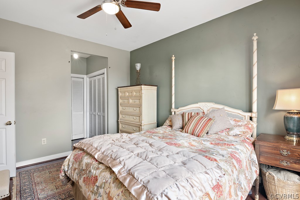 1767 Raintree Commons Drive Henrico, VA 23238 - Photo 17 of 27 a bedroom with a bed and a lamp