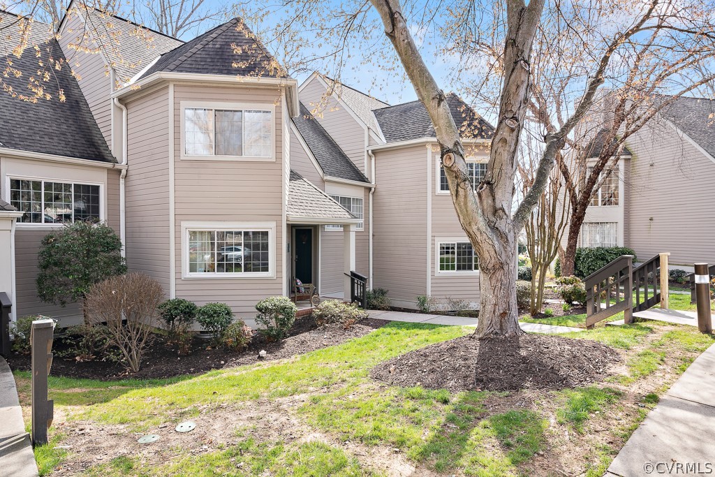 1767 Raintree Commons Drive Henrico, VA 23238 - Photo 3 of 27 a front view of a house with a yard