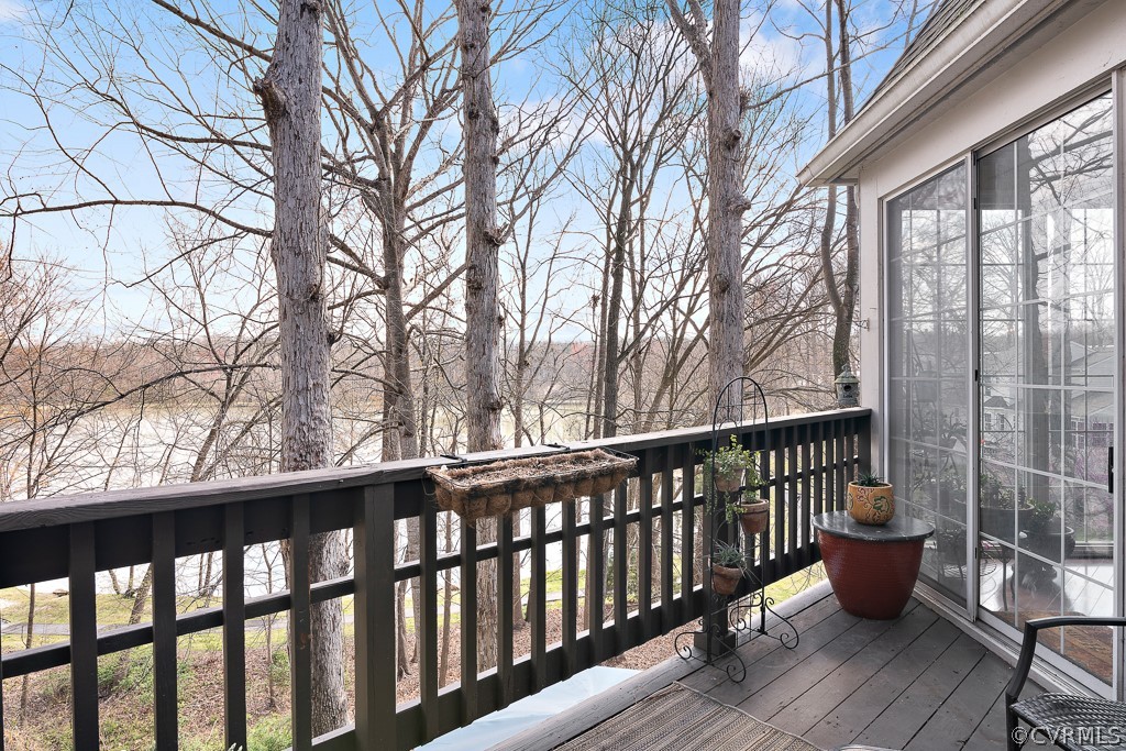 1767 Raintree Commons Drive Henrico, VA 23238 - Photo 7 of 27 a view of balcony with wooden floor and fence