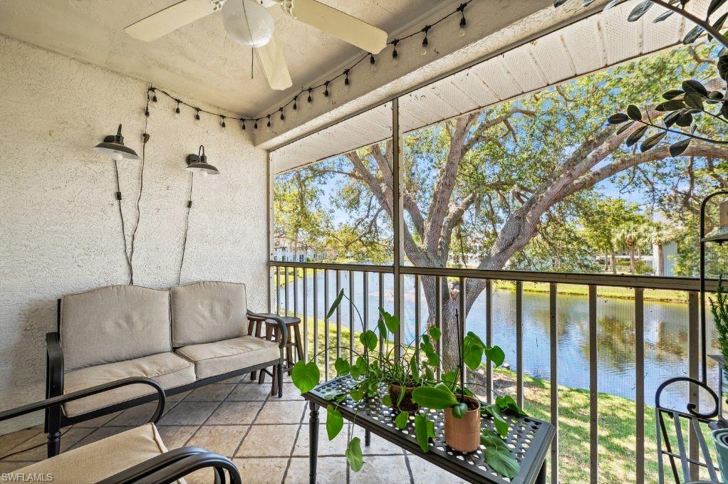 137 Wading Bird Circle, Unit F203 Naples, FL 34110 - Photo 3 of 3 a balcony with furniture