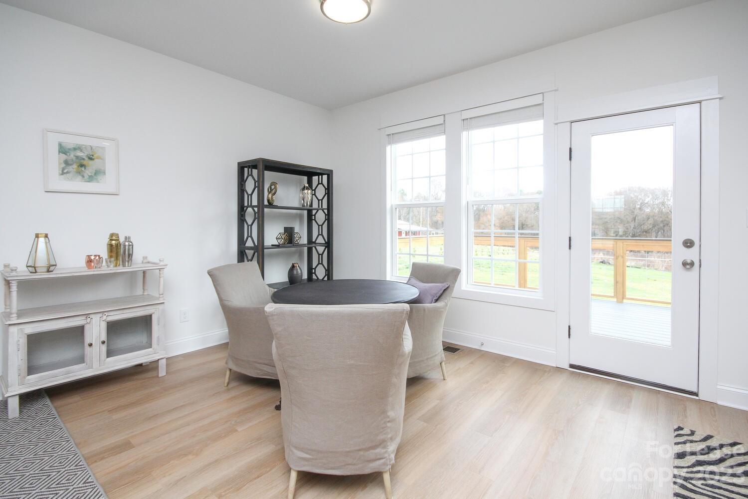 1084 Startown Road Lincolnton, NC 28092 - Photo 10 of 48 a living room with furniture and a window