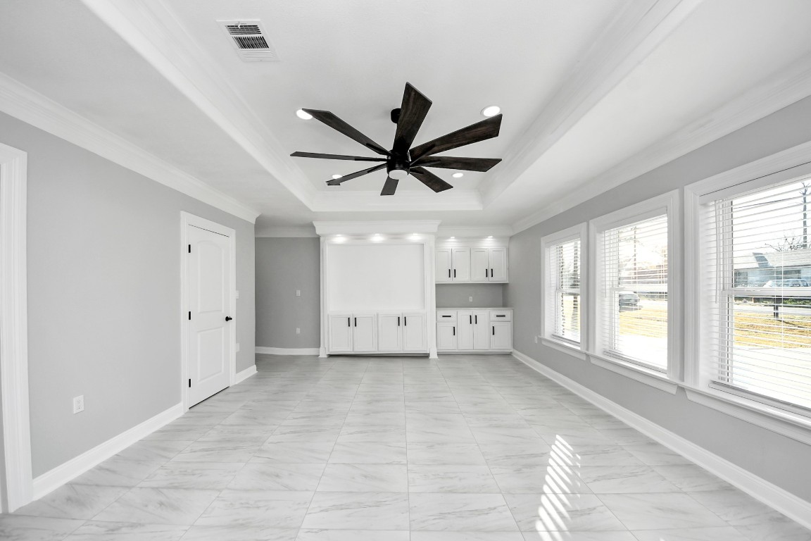 16121 Palm Street Channelview, TX 77530 - Photo 14 of 26 a living room with furniture and a large window