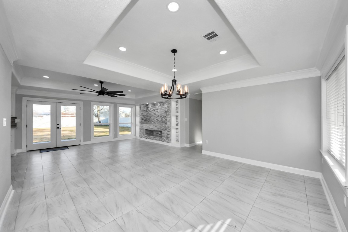 16121 Palm Street Channelview, TX 77530 - Photo 5 of 26 a view of an empty room with window and wooden floor