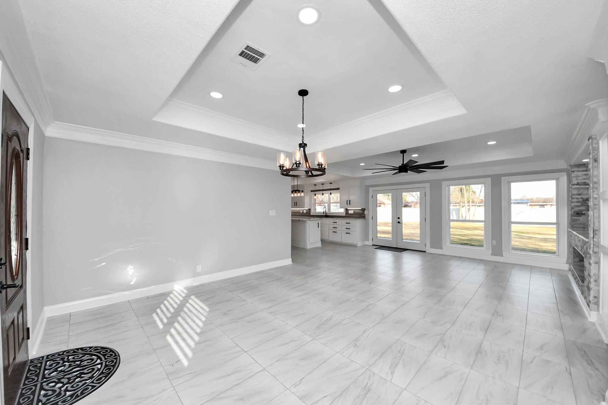 16121 Palm Street Channelview, TX 77530 - Photo 7 of 26 Dining room open to the living room. Tons of natural lightning.