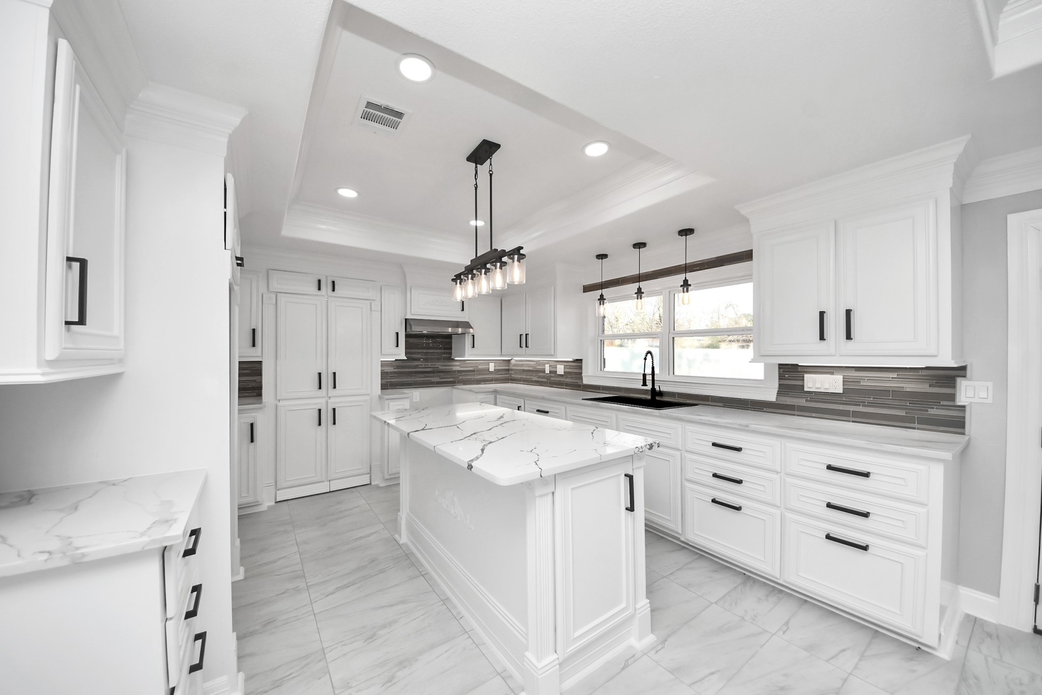 16121 Palm Street Channelview, TX 77530 - Photo 10 of 26 Behind the 4 door cabinets will be your secret laundry room.