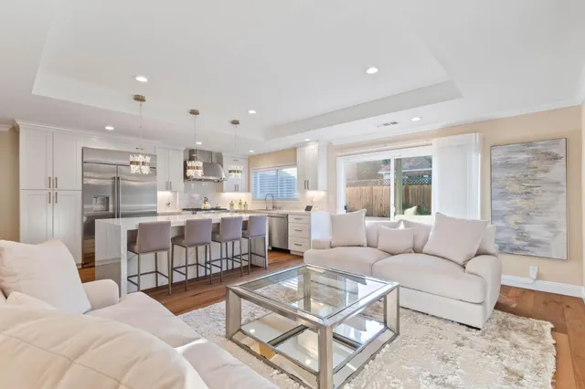 a living room with furniture and a table