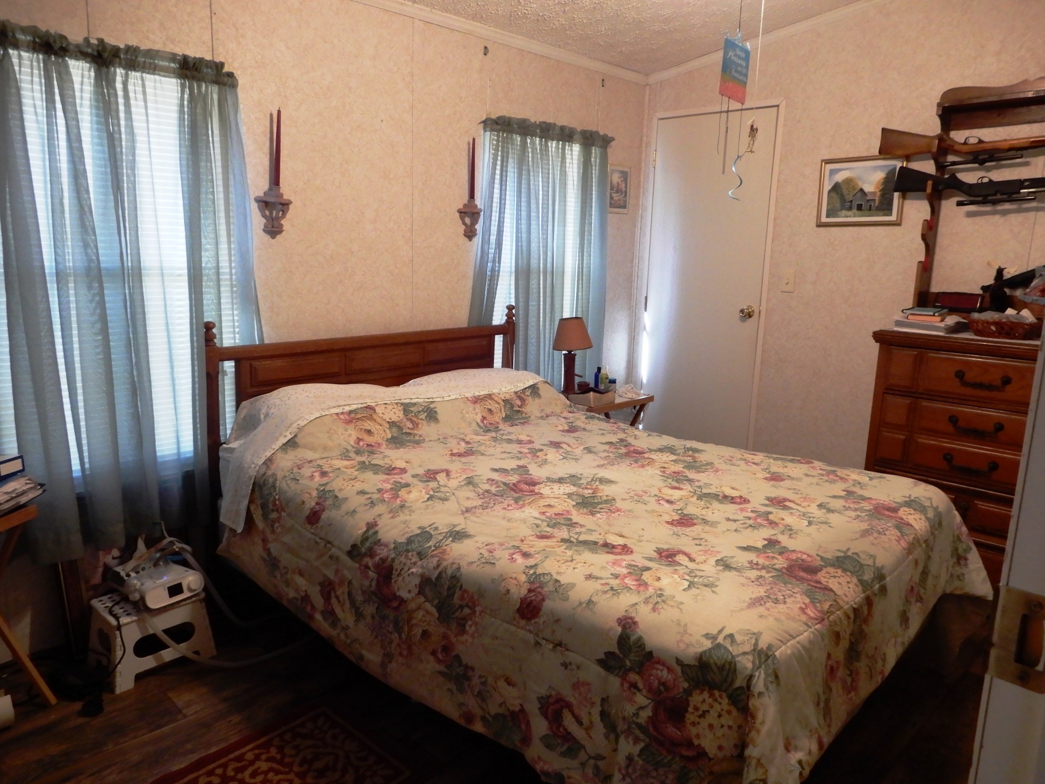 726 Plunders Creek Road Dickson, TN 37055 - Photo 6 of 14 a bedroom with a bed and wooden floor